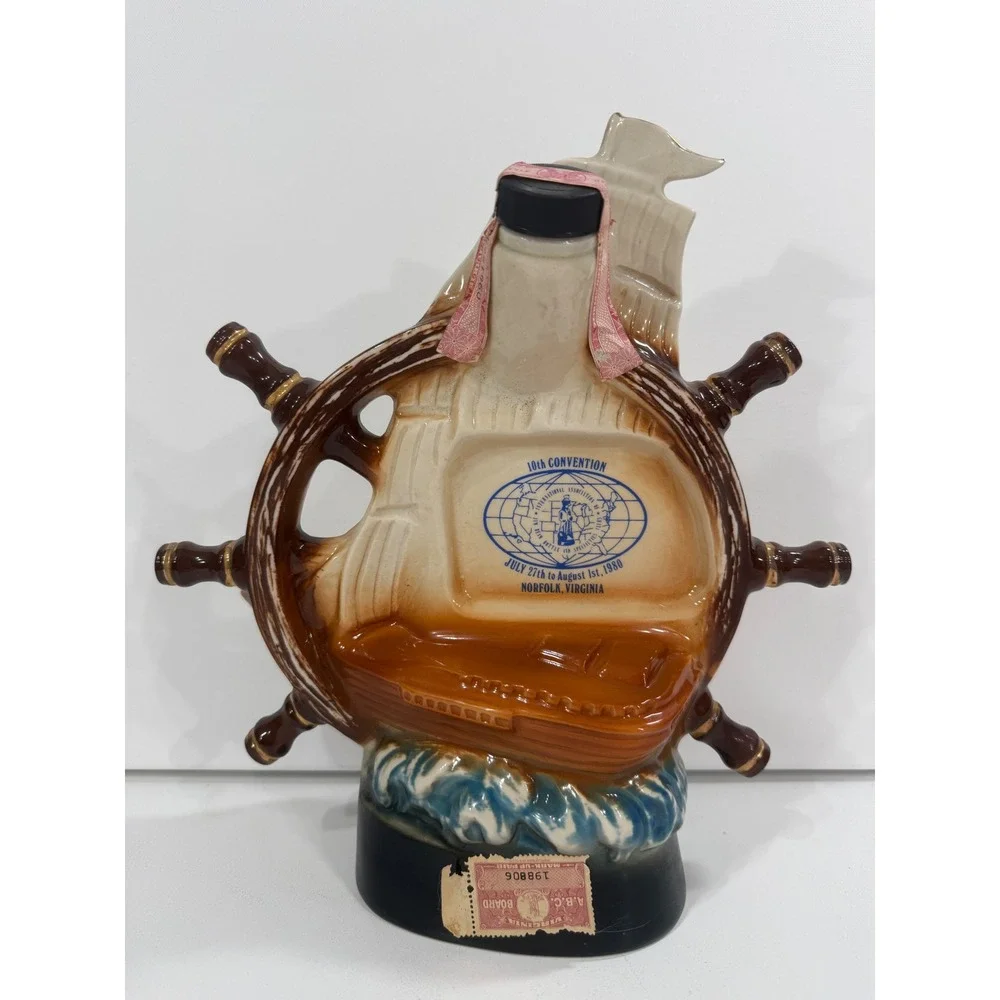 Vintage Jim Beam Decanter Set USS Beam Ship Wheel & James Lockhart Sailfish Art